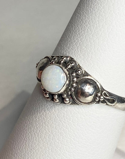 Handmade sterling silver ring with a white Australian opal.