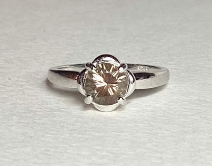 Sterling silver ring with a 1.18ct round Oregon Sunstone solitaire.