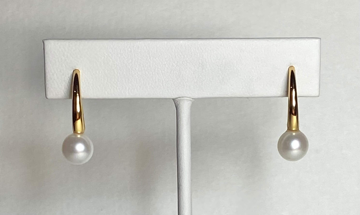 Gold vermeil drop earrings featuring 7mm cultured pearls.