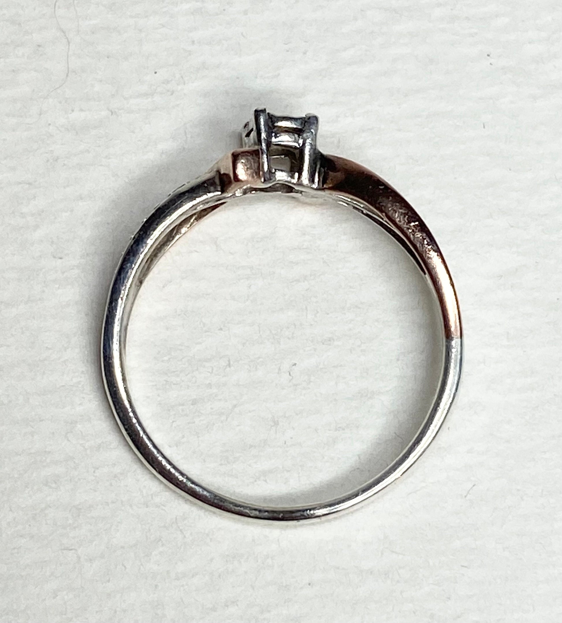 Bypass diamond ring in 10k rose gold and sterling silver, size 7.