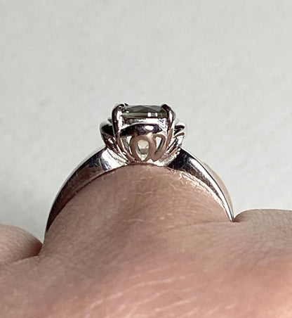 Sterling silver ring with a color-shifting Oregon Sunstone solitaire.