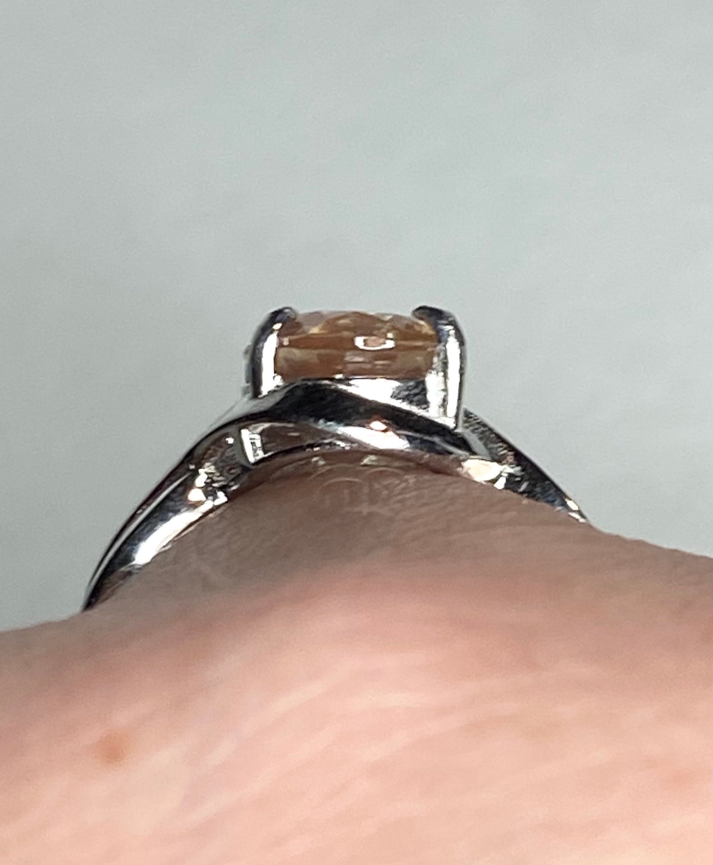 Sterling silver ring with an 8x10mm oval peach Oregon sunstone.