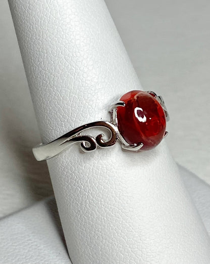 Red Oregon sunstone cabochon swirl ring in solid sterling silver.