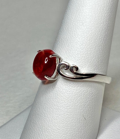 Red Oregon sunstone cabochon swirl ring in sterling silver.
