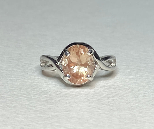 Sterling silver ring with an 8x10mm oval peach Oregon sunstone.