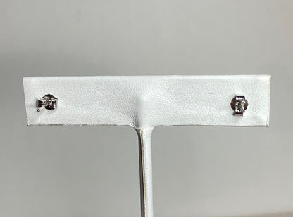 Sterling silver stud earrings with chrome diopside and cubic zirconia.