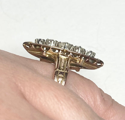 Antique Victorian navette ring with diamonds and black enamel on 14k gold.