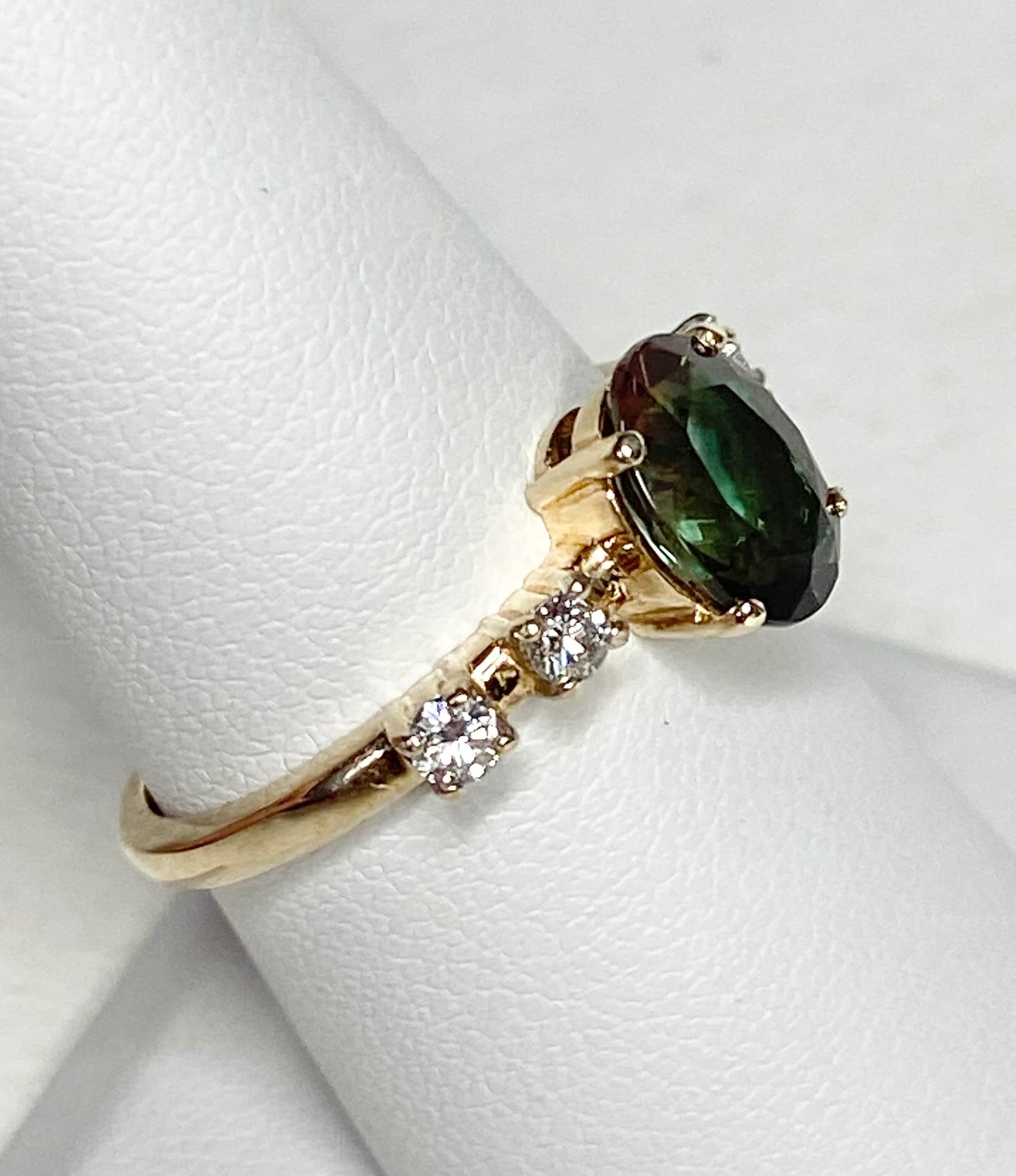 Green Oregon Sunstone and diamond ring in 10k yellow gold.