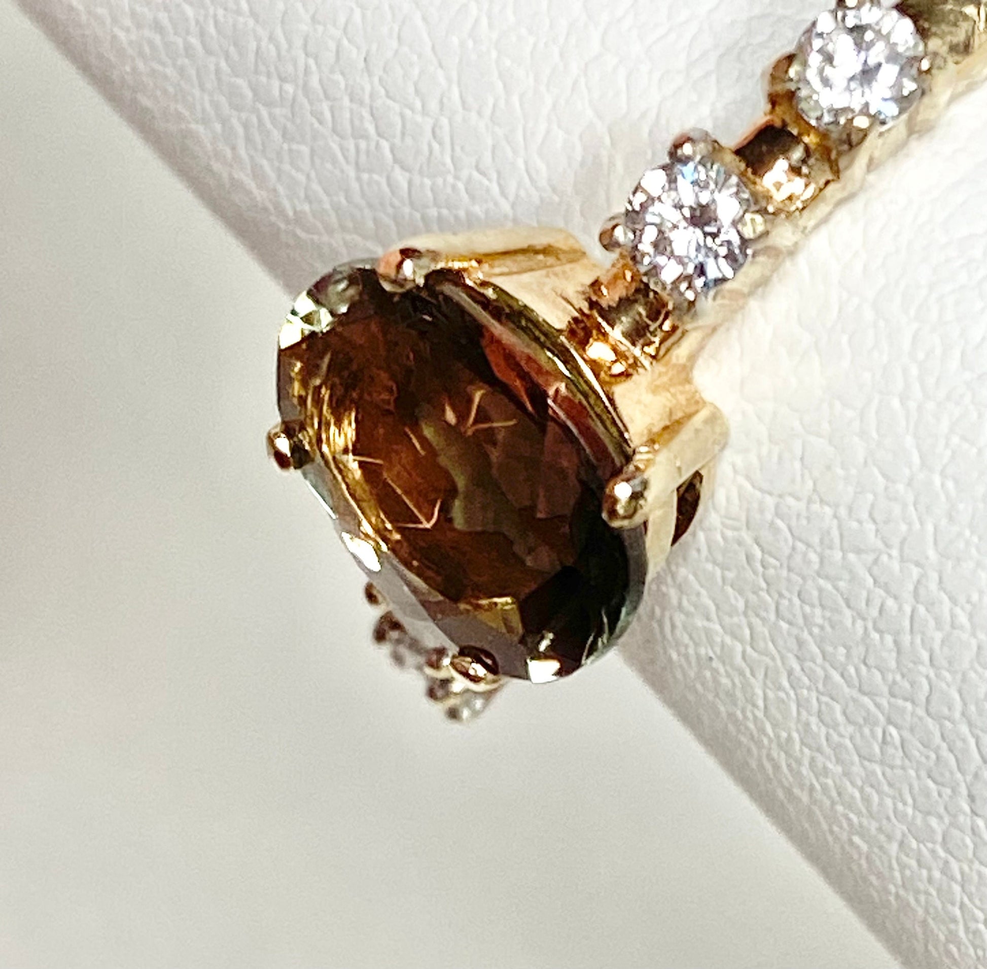 Green Oregon Sunstone and diamond ring in 10k yellow gold.
