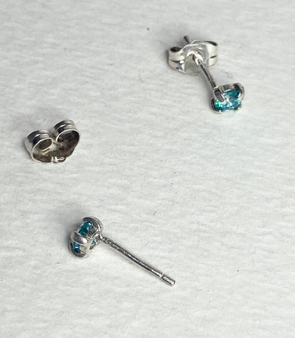 Sterling silver stud earrings with 3.5mm mint aqua Swarovski cubic zirconia.