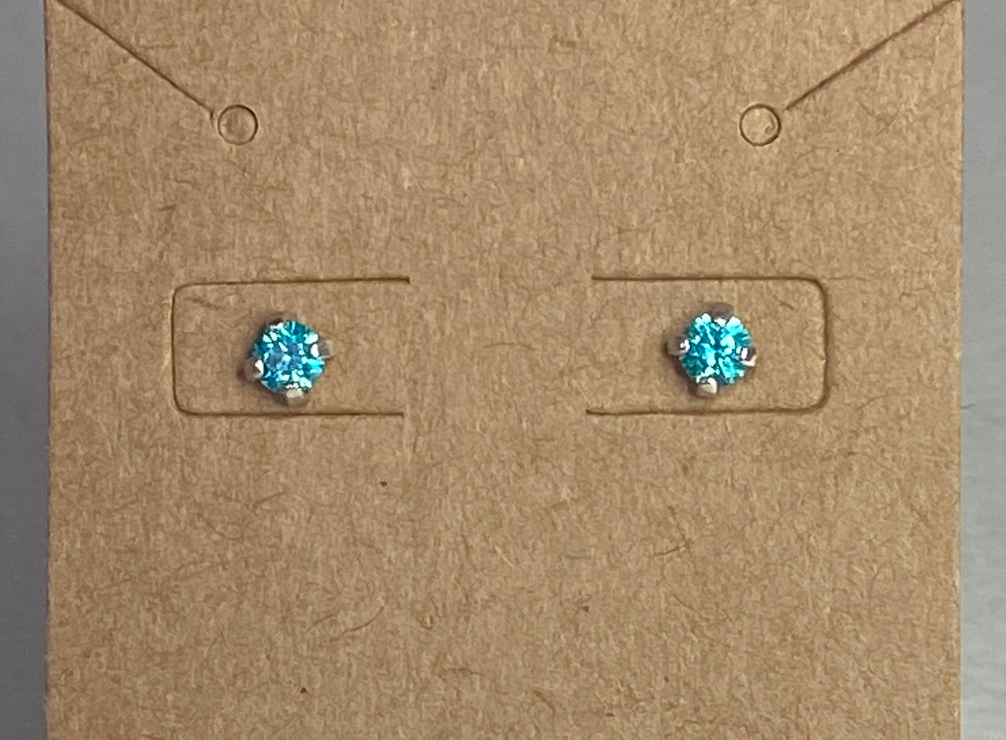 Mint aqua colored Swarovski CZ studs in sterling silver.