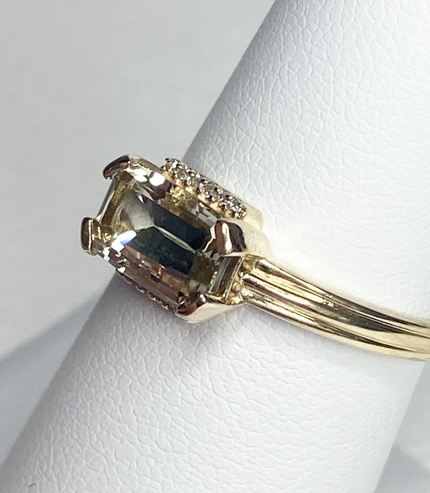 Light green Oregon Sunstone and diamond ring in 10k yellow gold.