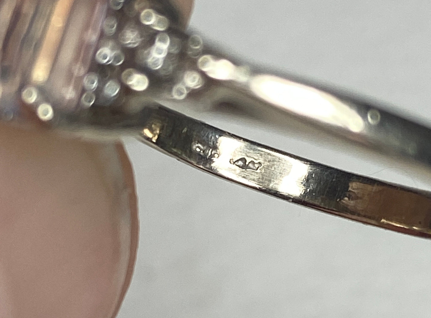 14k white gold ring with rainbow moonstone and diamonds.