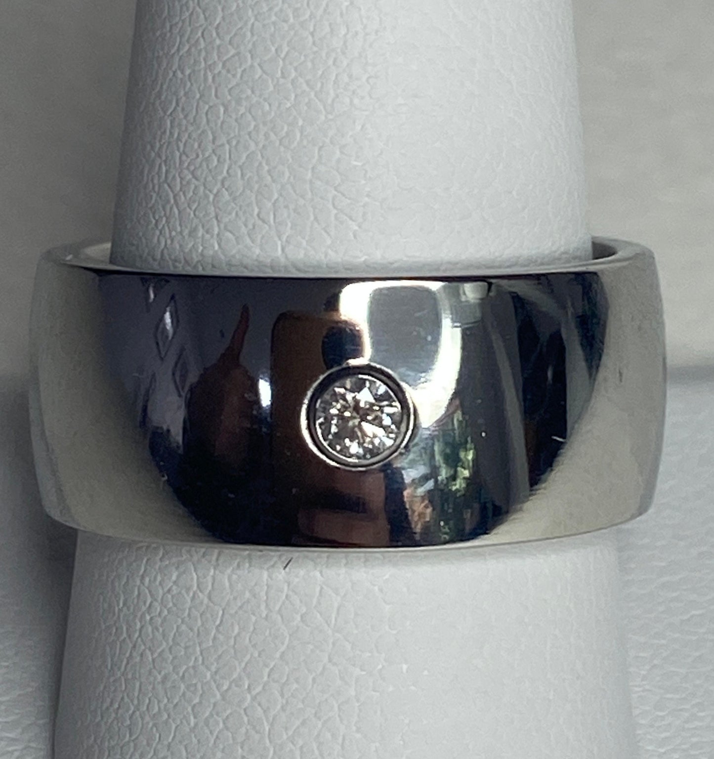Hefty cobalt band ring with a 1/10ct natural diamond, size 10.