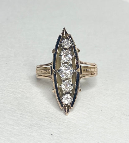 Antique Victorian navette ring with five old mine cut diamonds and black enamel.