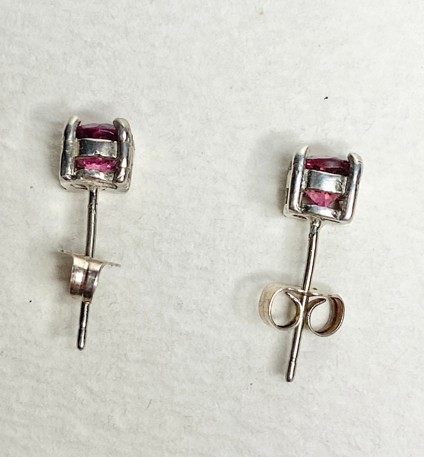 Purplish-pink rubellite tourmaline 5mm stud earrings in solid sterling silver.