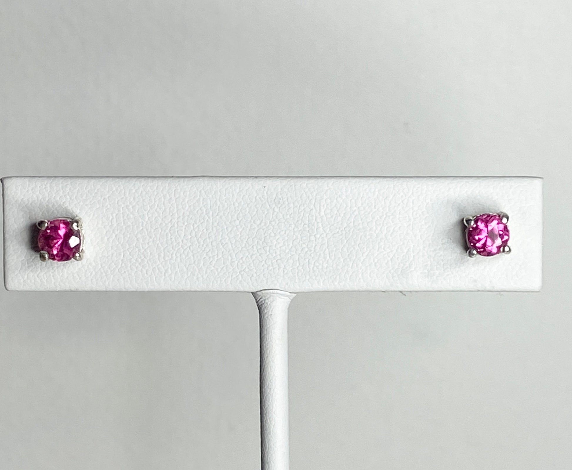 Purplish-pink rubellite tourmaline 5mm stud earrings in solid sterling silver.