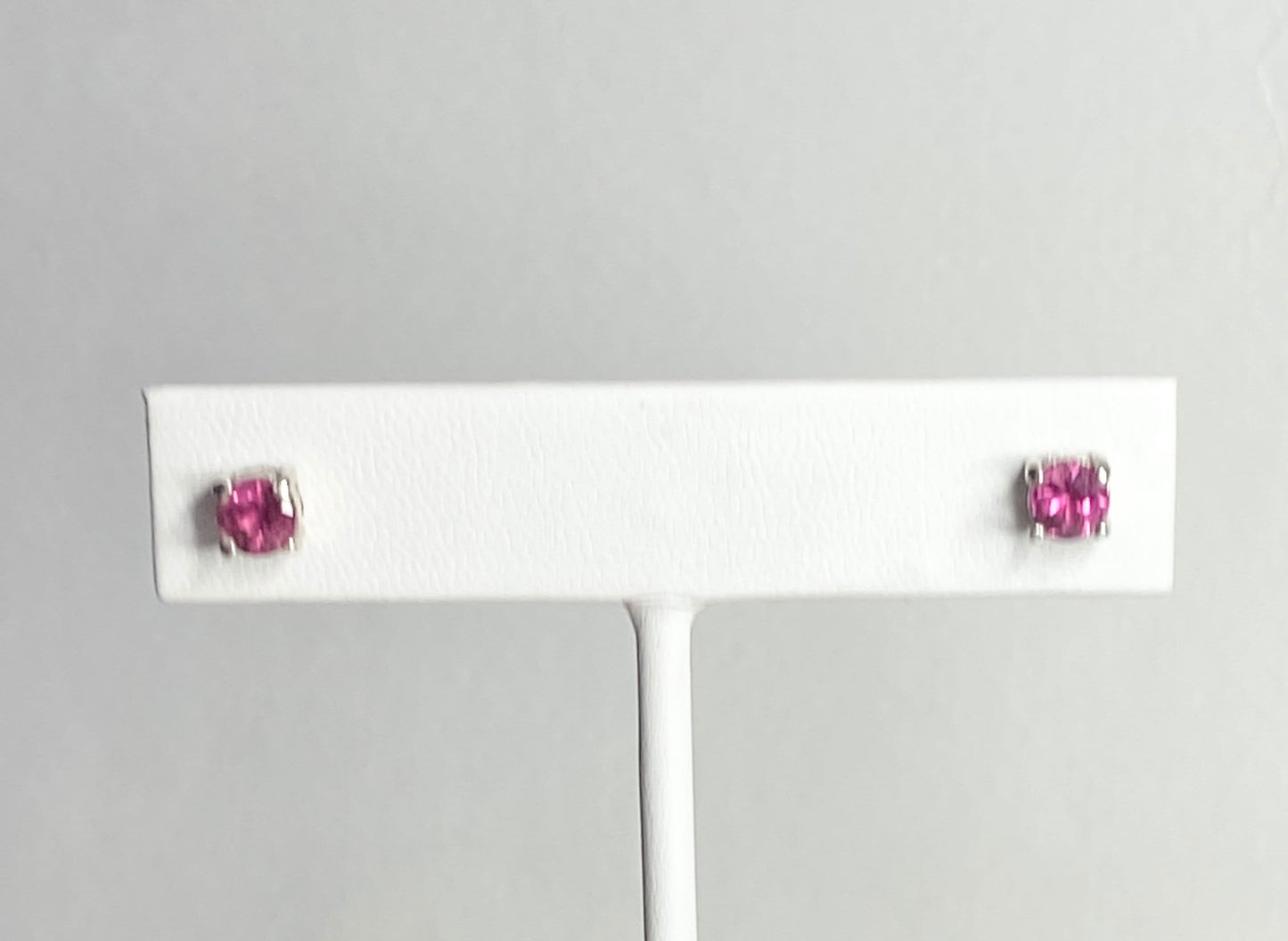 Purplish-pink rubellite tourmaline 5mm stud earrings in sterling silver.