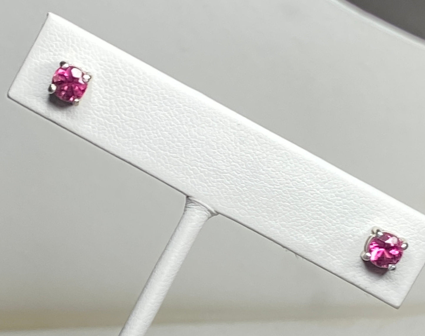 Purplish-pink rubellite tourmaline 5mm stud earrings in solid sterling silver.
