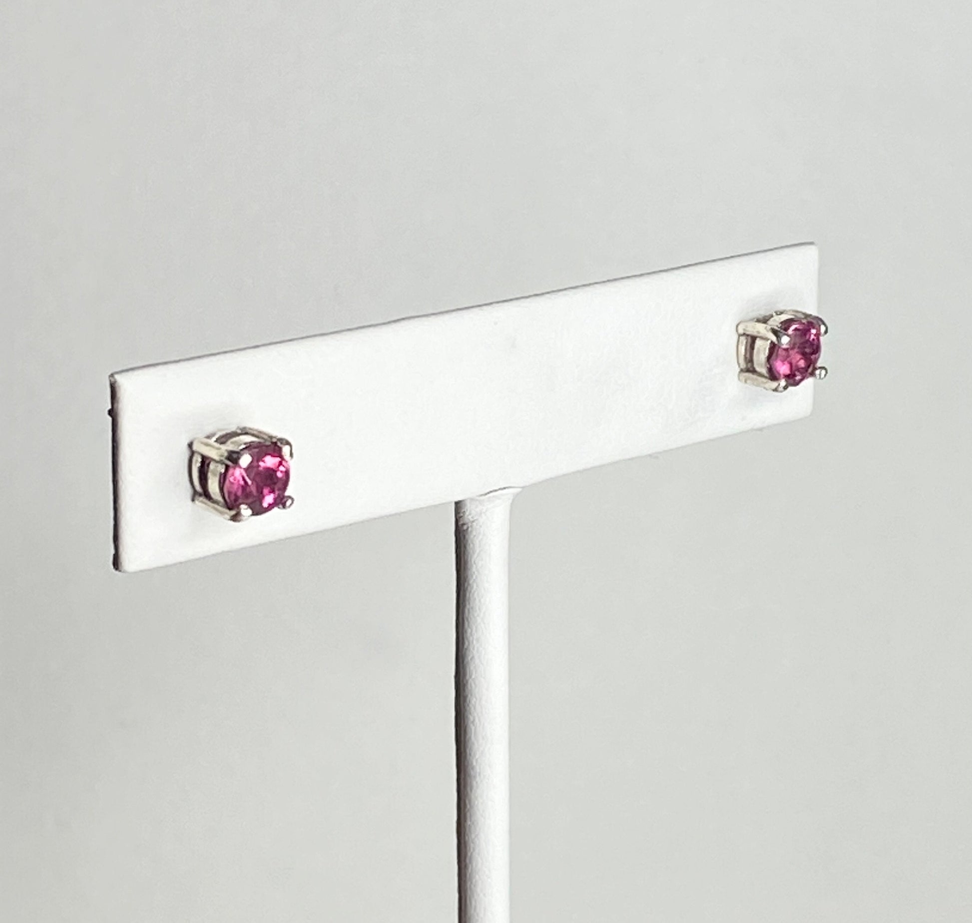 Purplish-pink rubellite tourmaline 5mm stud earrings in sterling silver.