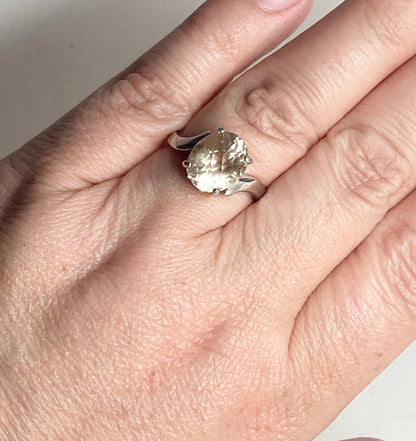Sterling silver ring with a checkerboard faceted Oregon sunstone.