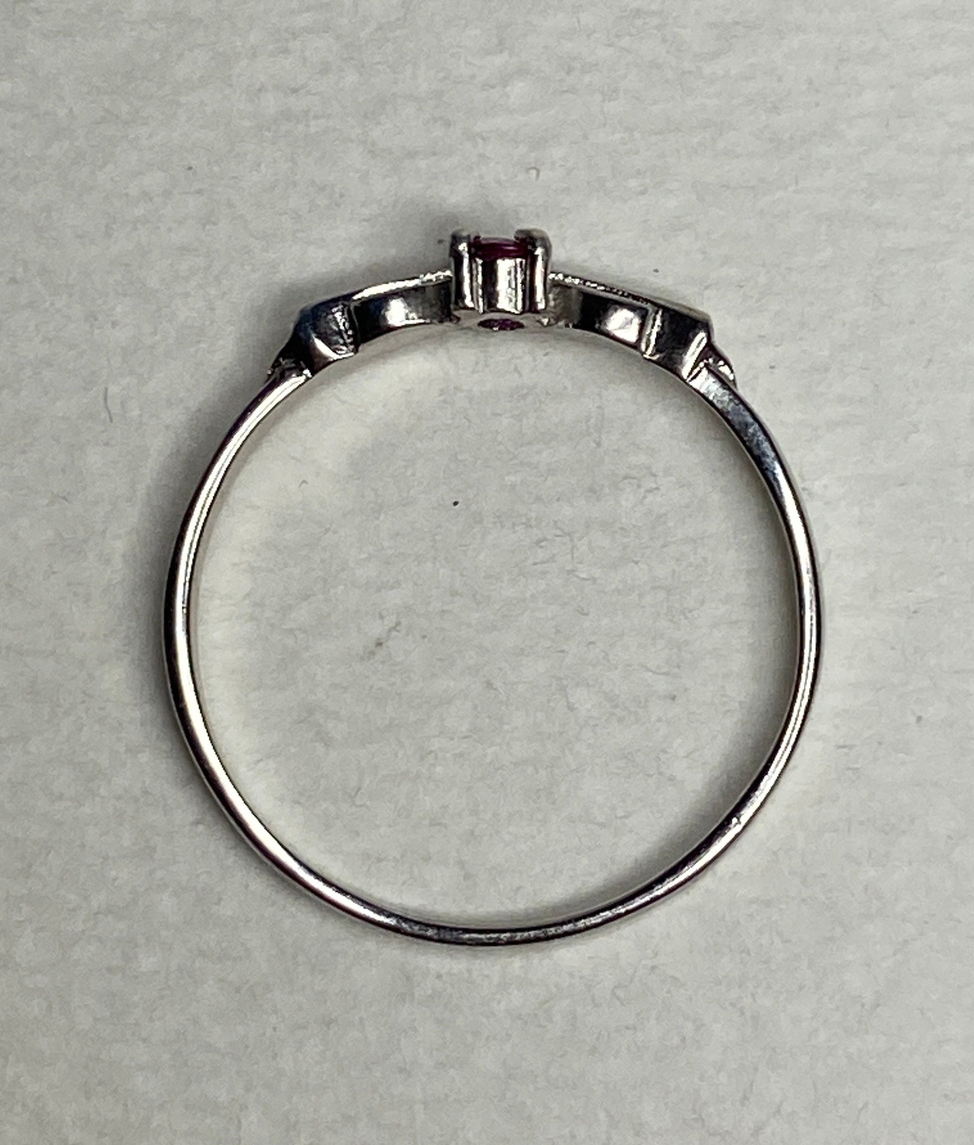 Petite Burmese ruby spade arrowhead design ring in sterling silver.