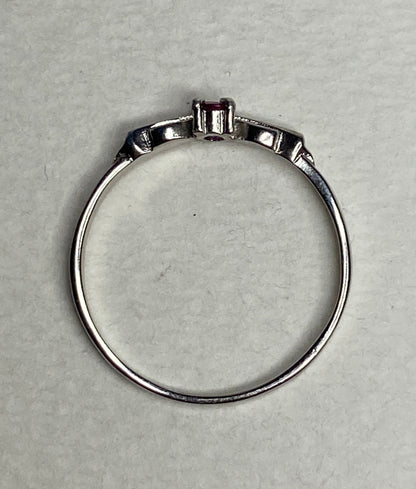 Petite Burmese ruby spade arrowhead design ring in sterling silver.