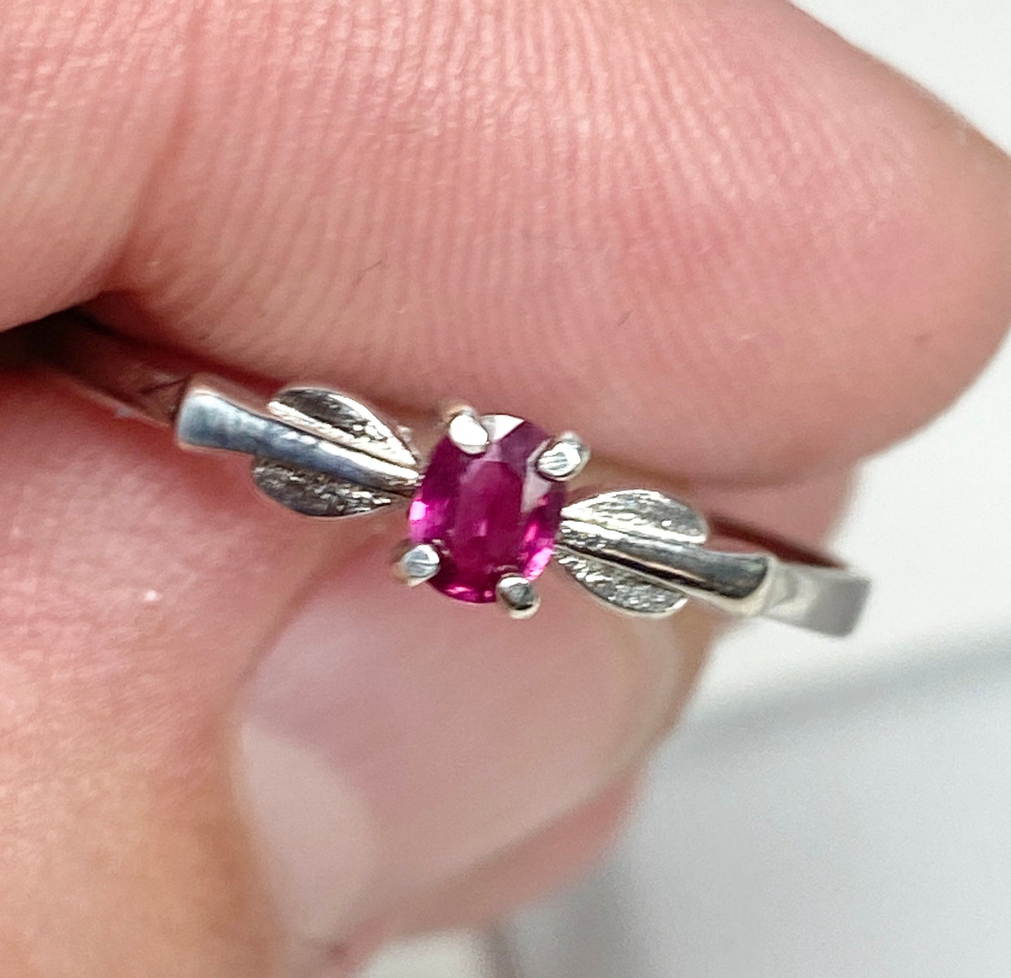 Petite Burmese ruby spade arrowhead design ring in sterling silver.