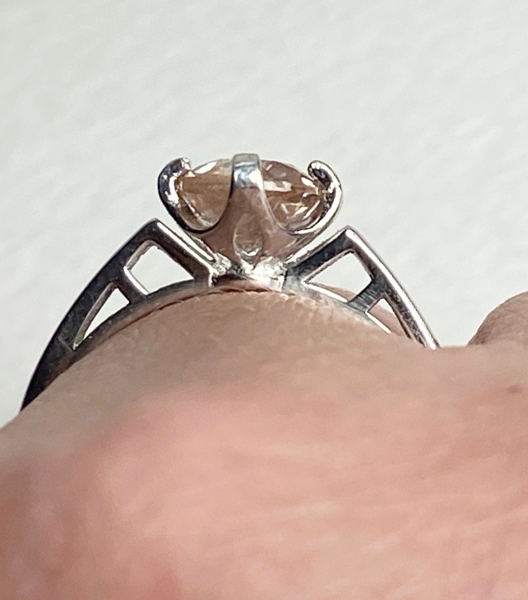 Sterling silver ring with a light peach Oregon sunstone.