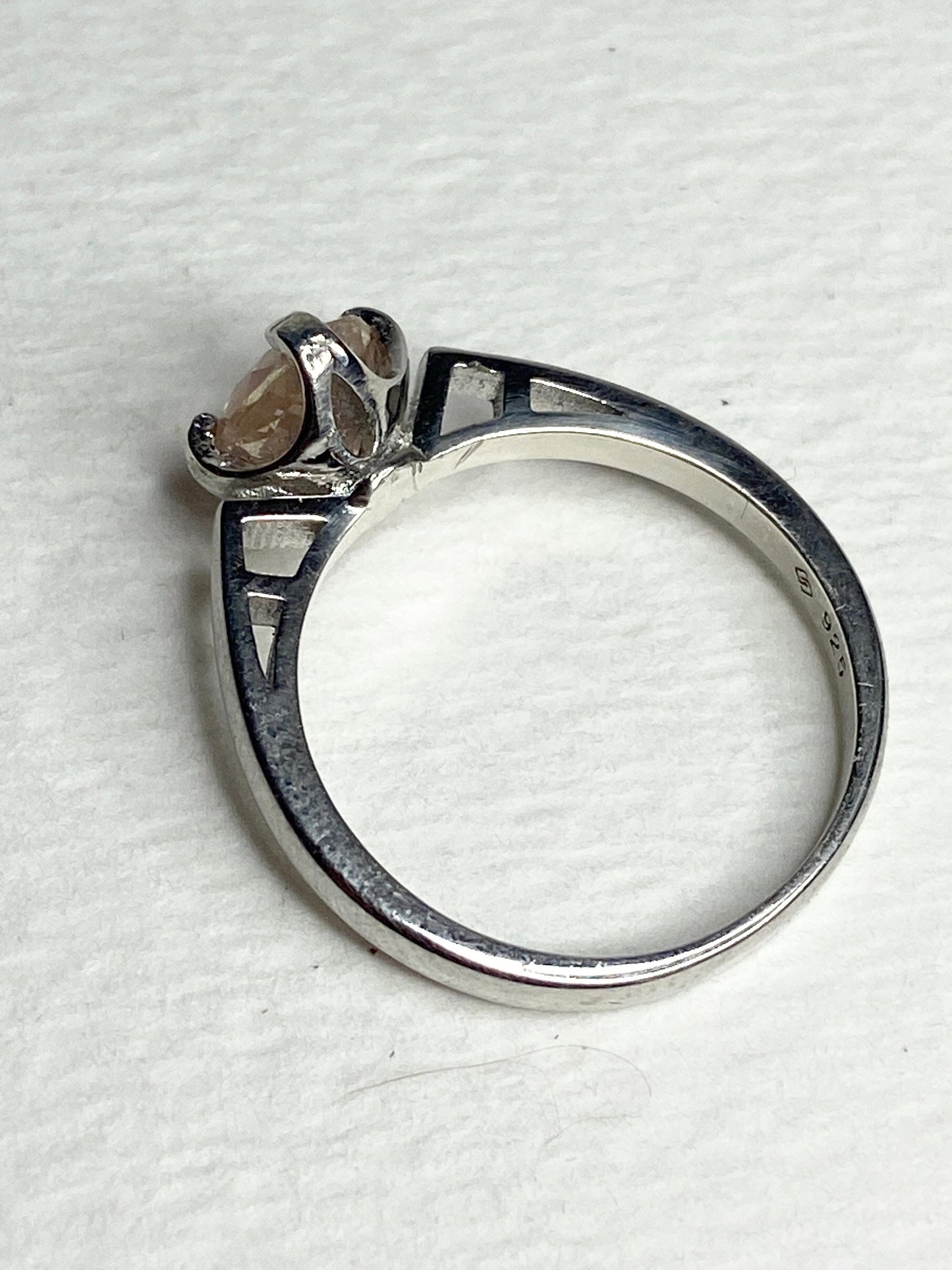 Sterling silver ring with a light peach Oregon sunstone.