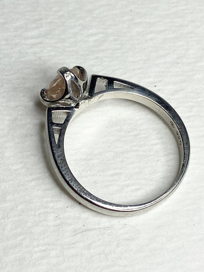 Sterling silver ring with a light peach Oregon sunstone.