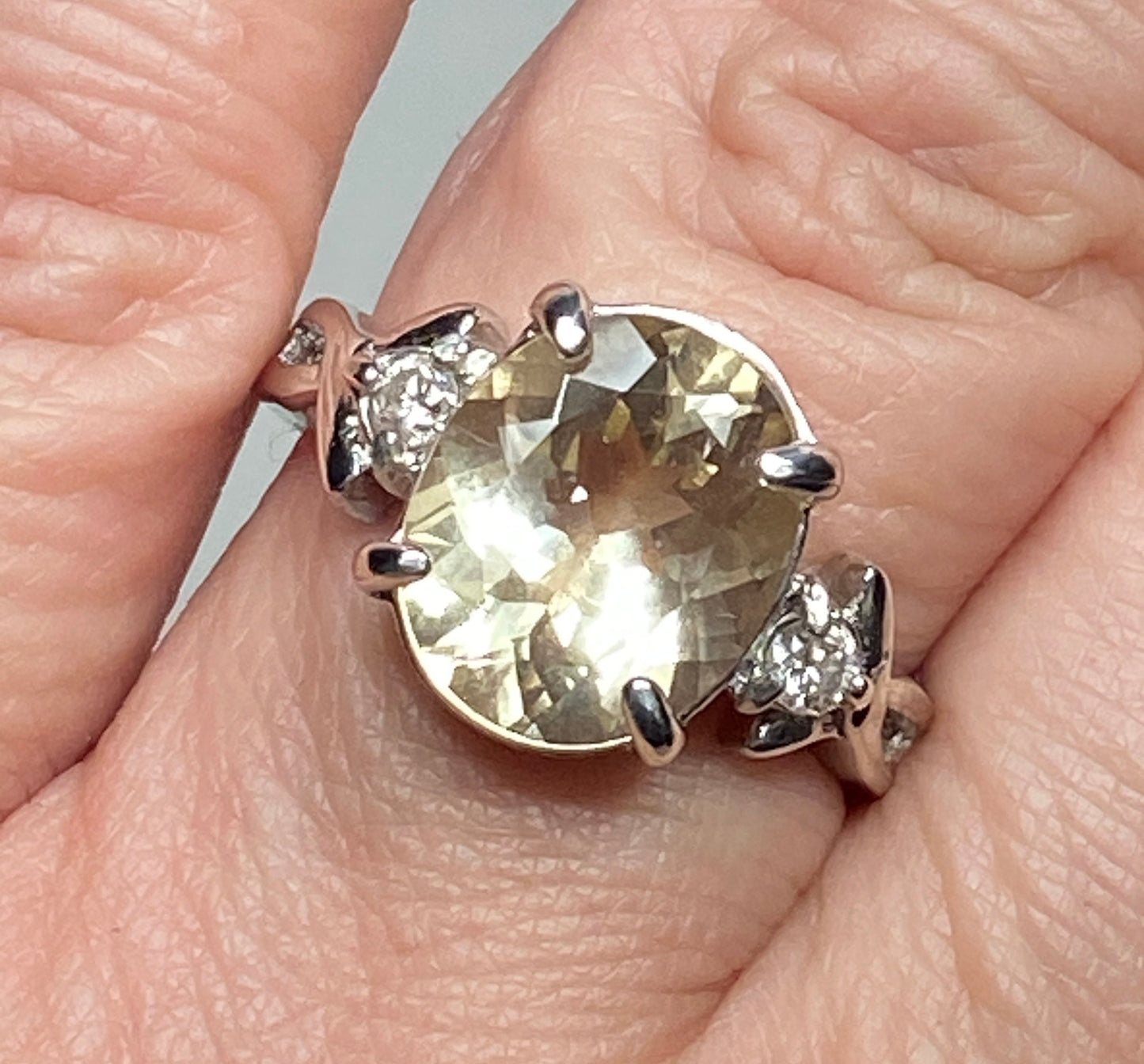 Oval Oregon sunstone and diamond sterling silver ring.