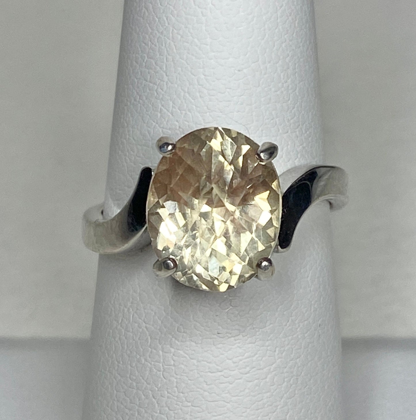 Sterling silver ring with a checkerboard faceted Oregon sunstone.