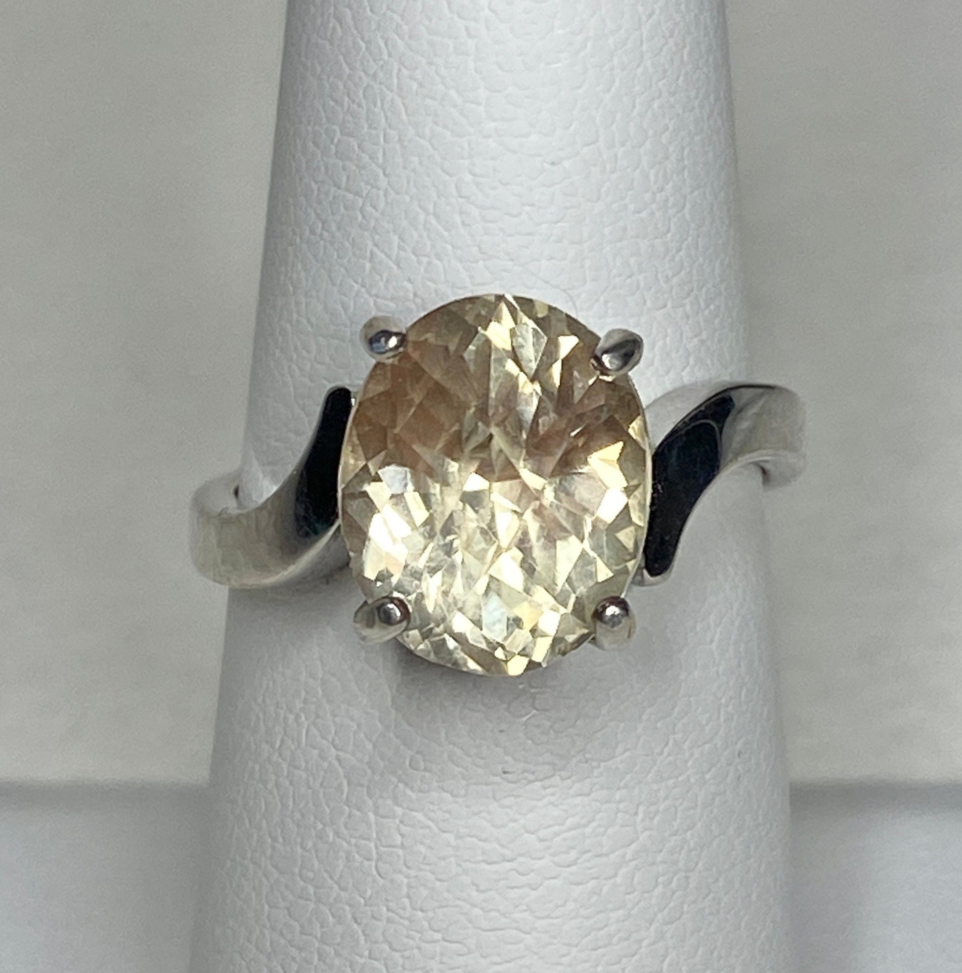 Sterling silver ring with a checkerboard faceted Oregon sunstone.