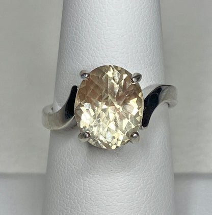 Sterling silver ring with a checkerboard faceted Oregon sunstone.