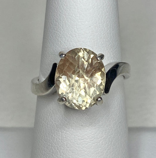 Sterling silver ring with a checkerboard faceted Oregon sunstone.