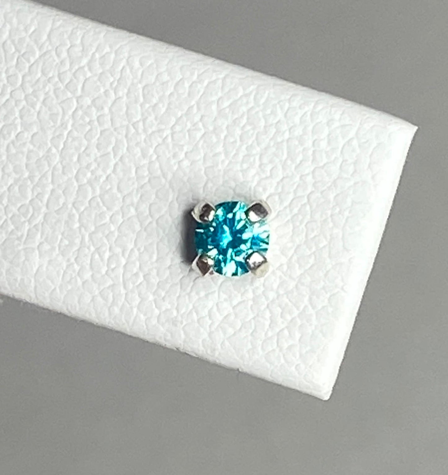 Mint aqua colored Swarovski CZ studs in sterling silver.