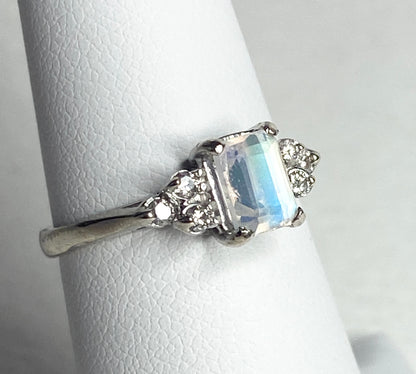 Ring with rainbow moonstone and diamonds in 14k white gold.