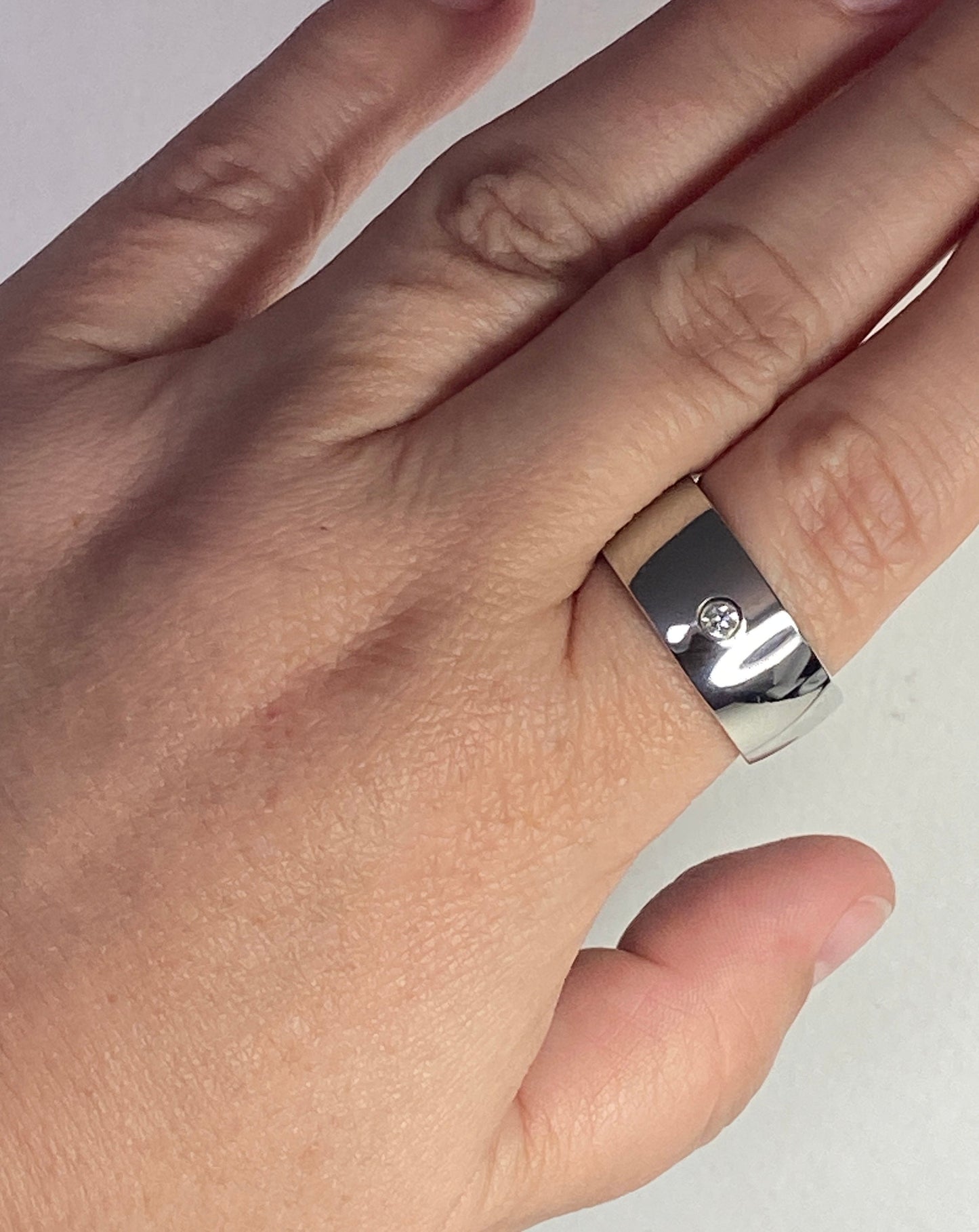 Hefty cobalt band ring with a 1/10ct natural diamond, 10mm wide, size 10.