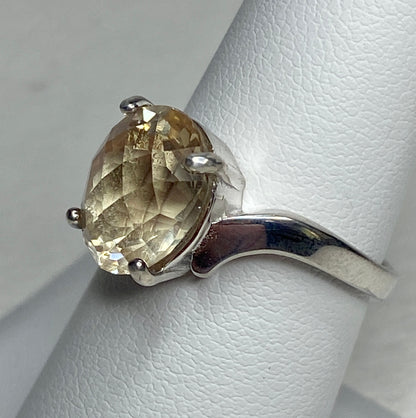 Sterling silver ring with a checkerboard faceted 4ct Oregon sunstone.