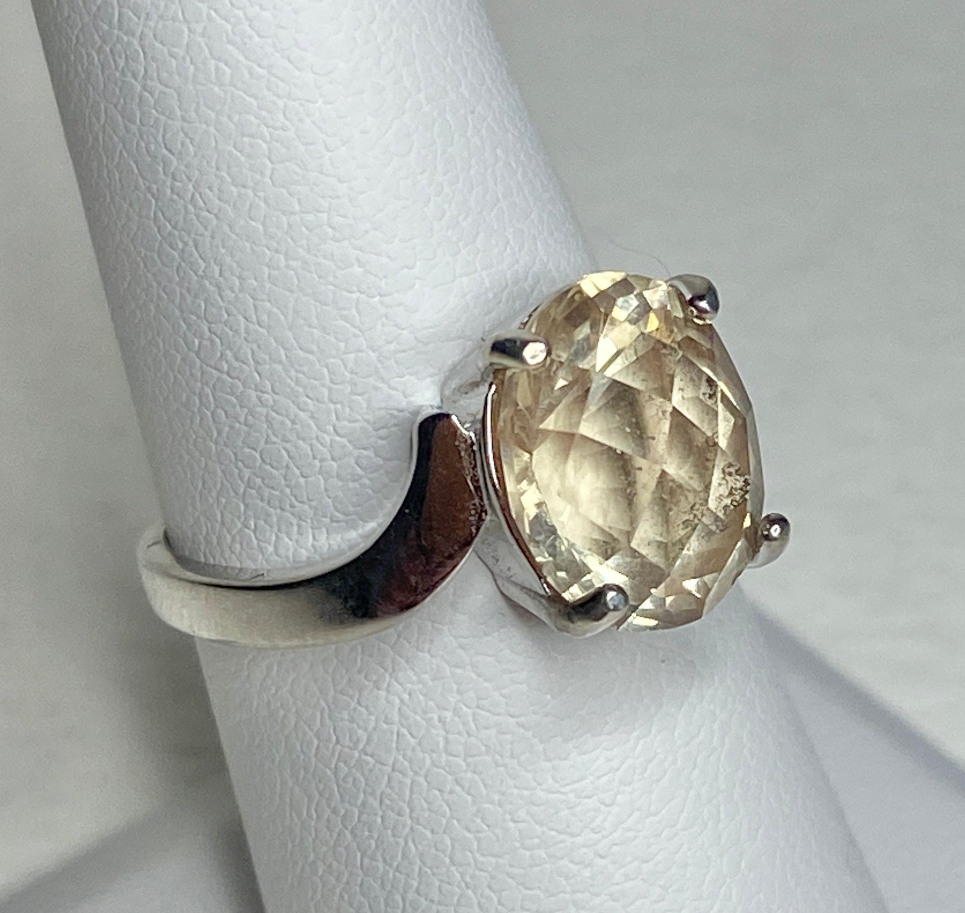 Sterling silver ring with a checkerboard faceted Oregon sunstone.