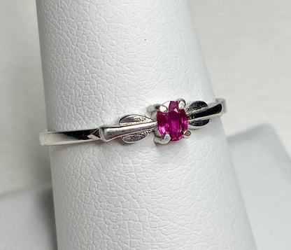 Petite Burmese ruby ring in sterling silver with a spade arrowhead design.