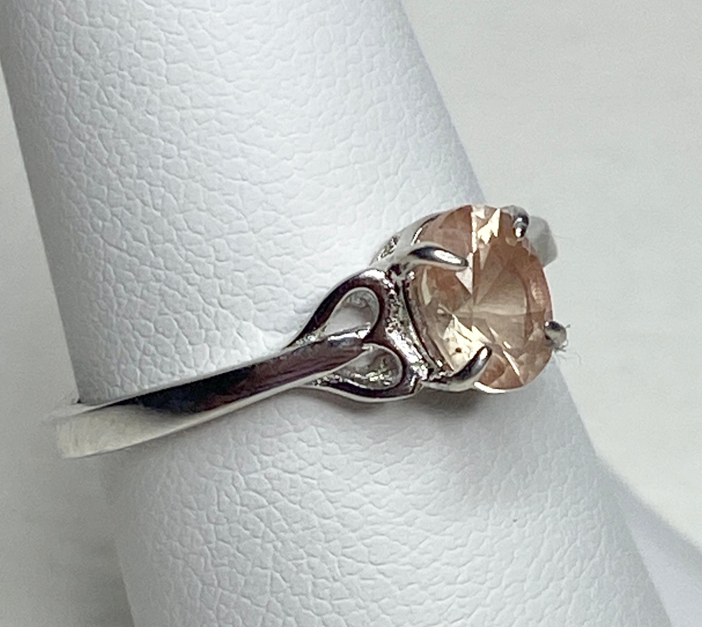 Sterling silver ring with a light peach Oregon sunstone.