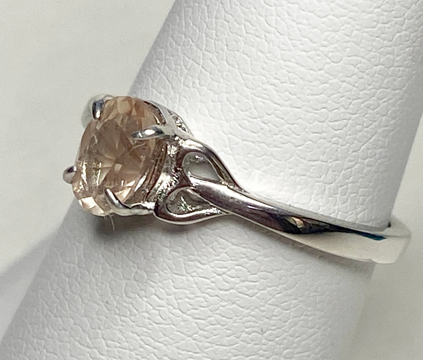 Sterling silver ring with a light peach Oregon sunstone.