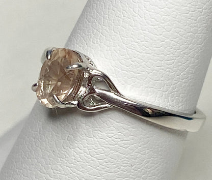Sterling silver ring with a light peach Oregon sunstone.