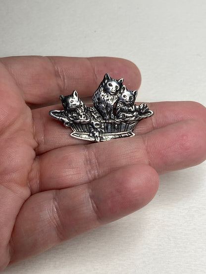 Sterling silver brooch pendant of three cats in a basket, made in Holland.