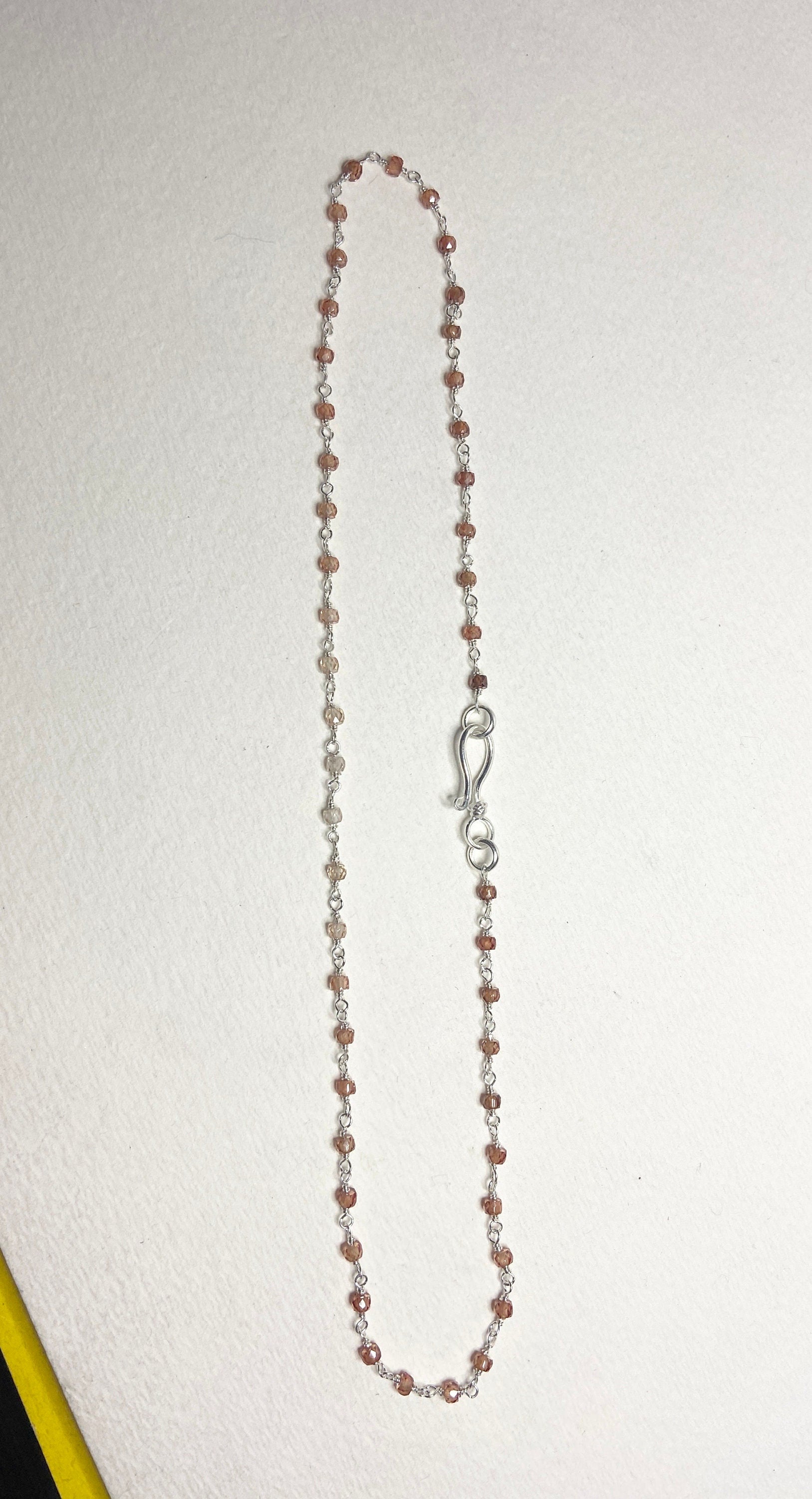 Sterling silver choker necklace with faceted brown ombre zircon beads and a hook clasp.