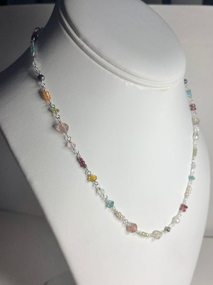 Sterling silver necklace with colorful multi-gemstone beads.