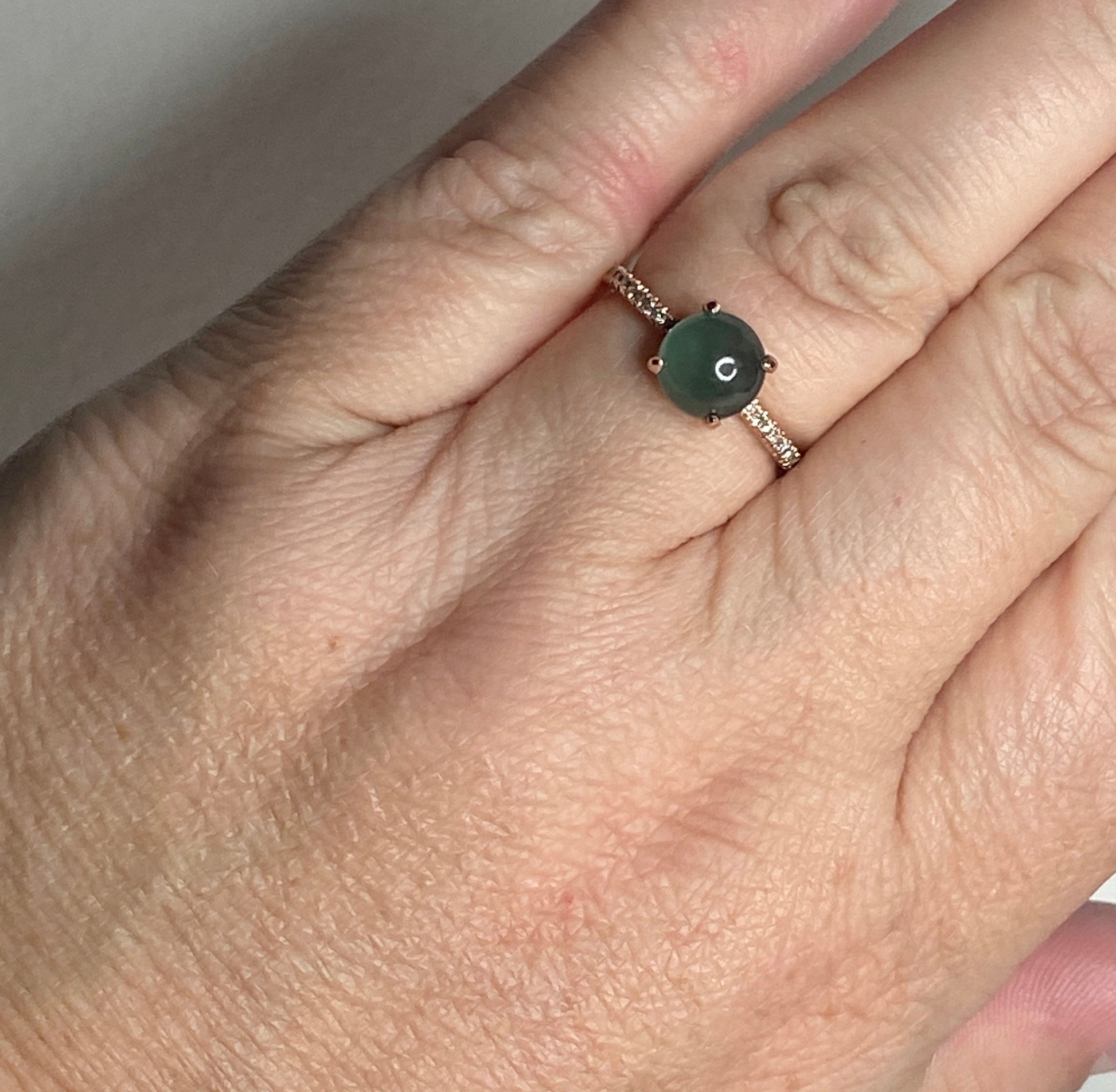 Untreated teal jadeite and diamond ring in 14k rose gold.
