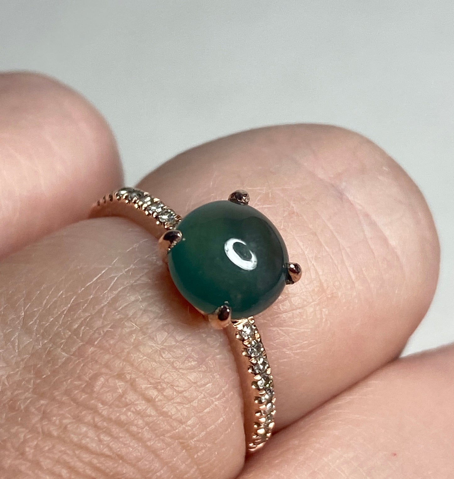 Untreated teal jadeite and diamond ring in 14k rose gold.